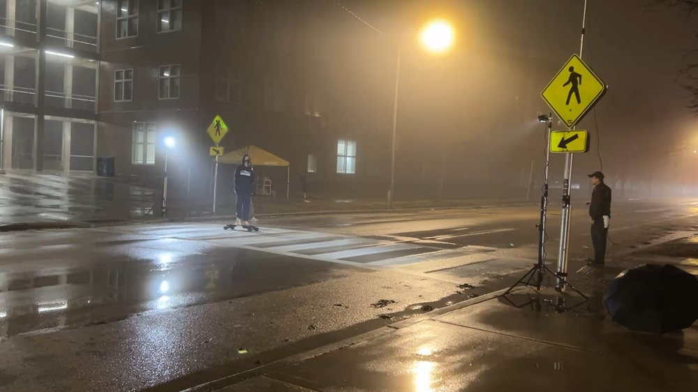Mannequin crossing in fog at night