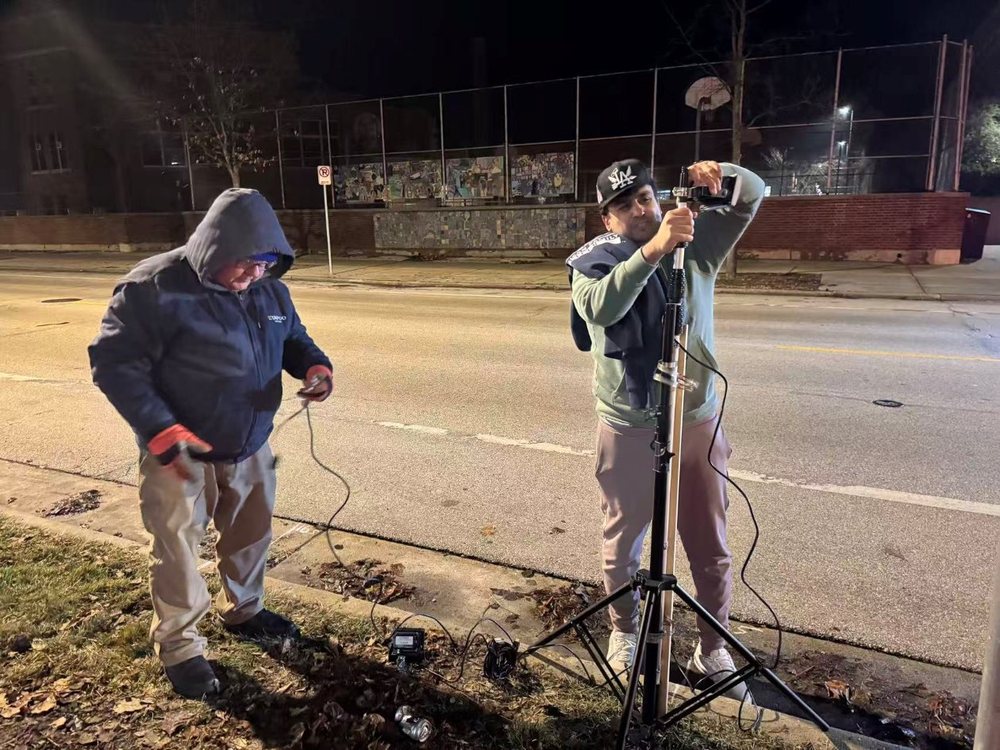 Team setting up equipment in the cold